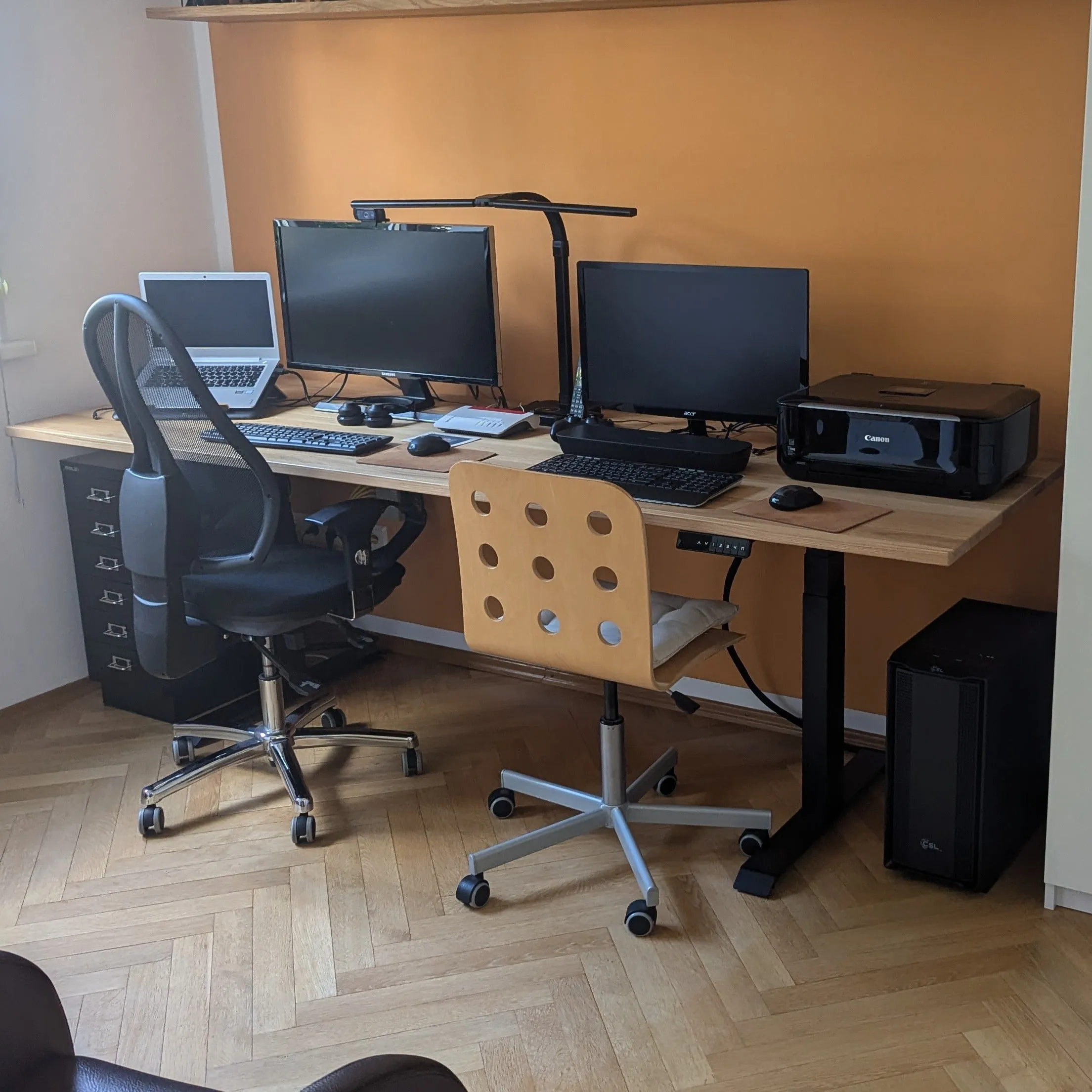 Oak standing desk with cable management unit